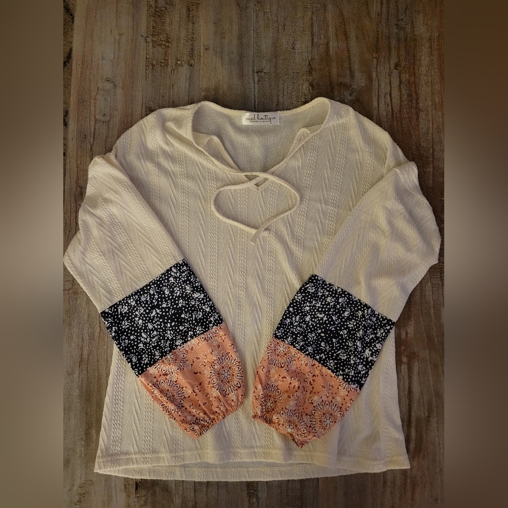 Chic Cream Blouse with Black and Pink Patterned Sleeves